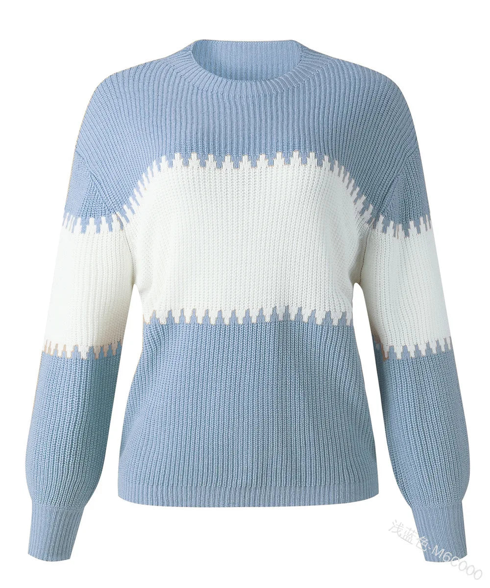 A light blue and white knit sweater with a textured chevron pattern, shown on a plain white background.