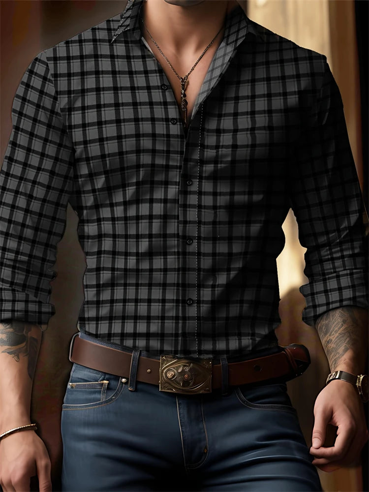 Person wearing a black and gray plaid shirt with rolled-up sleeves, blue jeans, and a brown belt.