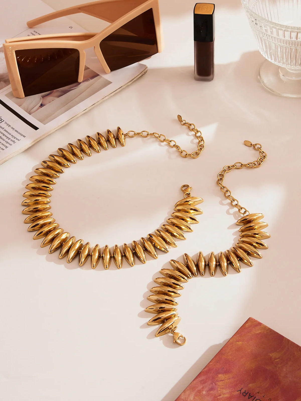 Sculptural Gold Beaded Jewelry Collection