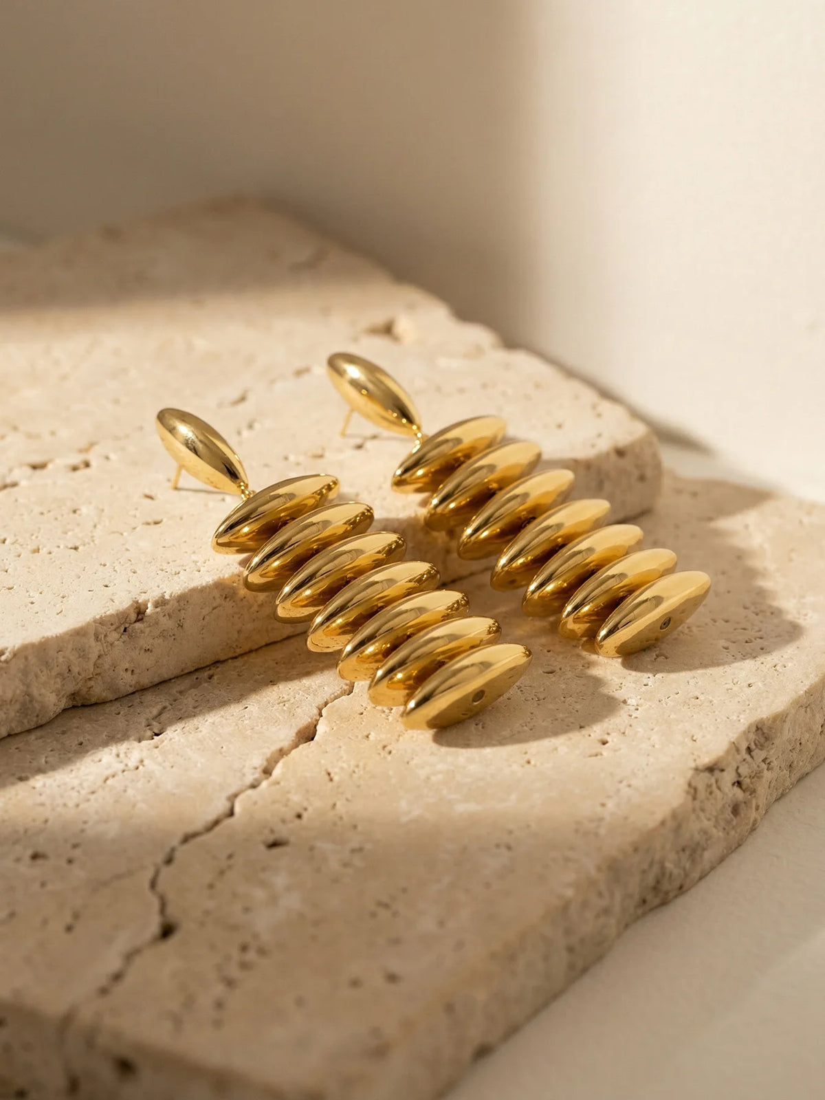 Sculptural Gold Beaded Jewelry Collection