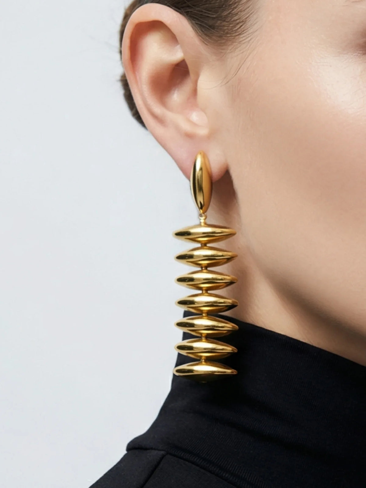 Sculptural Gold Beaded Jewelry Collection