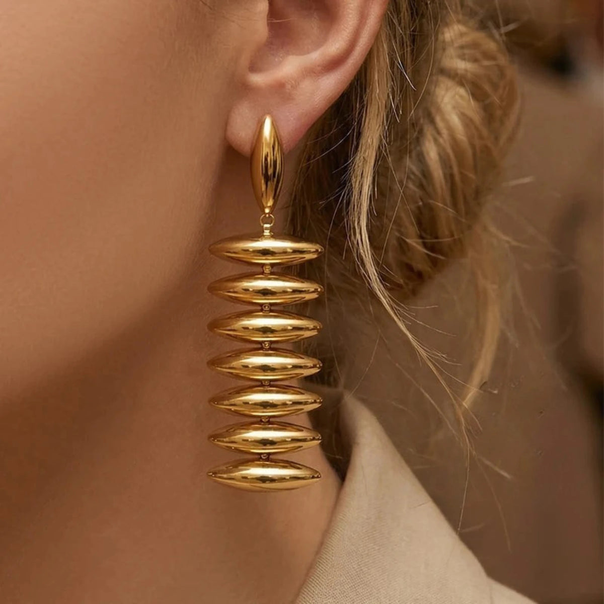 Sculptural Gold Beaded Jewelry Collection