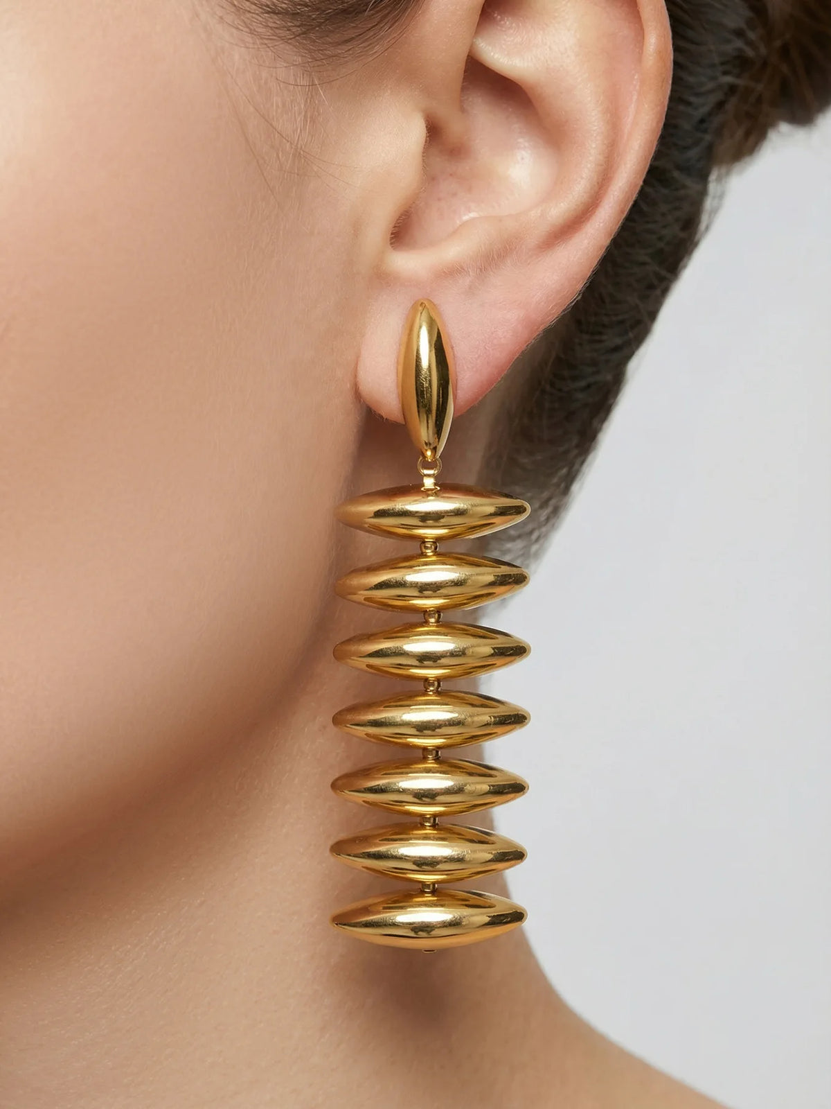 Sculptural Gold Beaded Jewelry Collection
