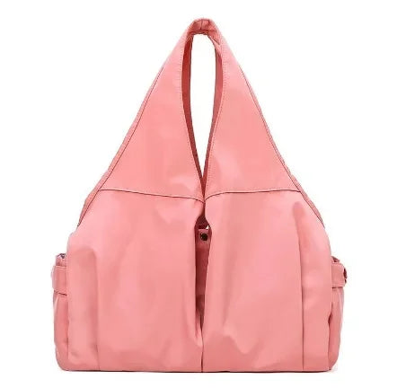 Pink shoulder bag on a white background