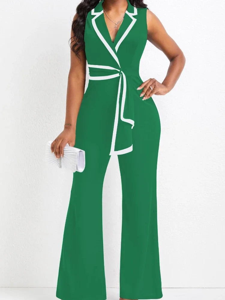 Green and white dress with a belt on a white background