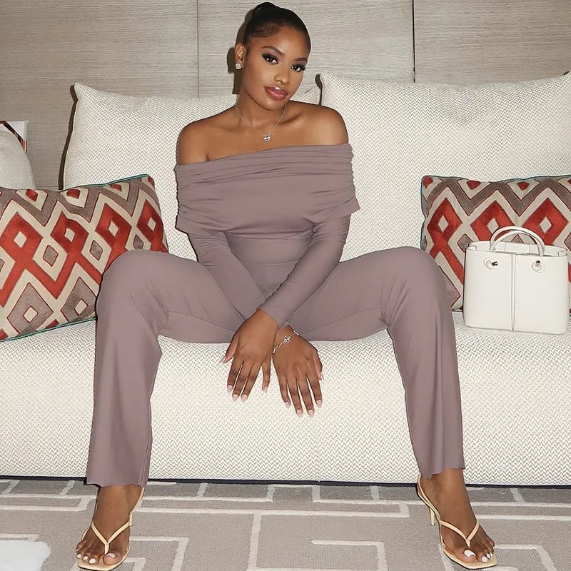 Woman wearing a chic off-shoulder strapless jumpsuit