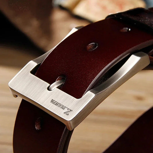 Cowhide leather belt for men showing polished zinc alloy buckle detail