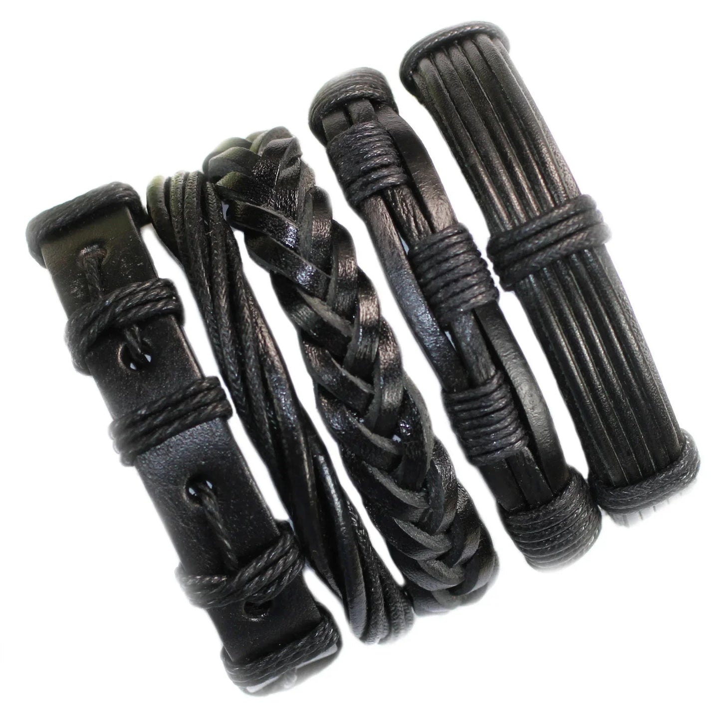 Set of black leather bracelets with metal clasps on a white background