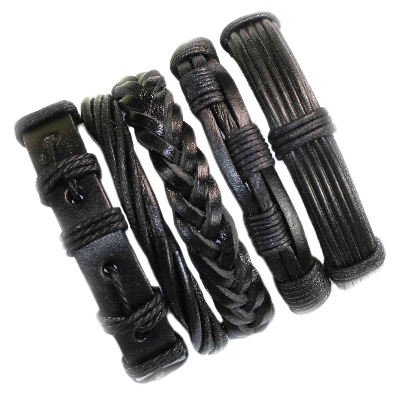 Set of black leather bracelets with metal clasps on a white background