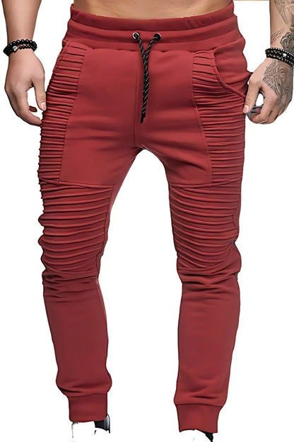Red jogger pants on a white background
