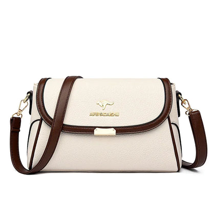 White handbag with brown accents and a visible brand logo on a white background