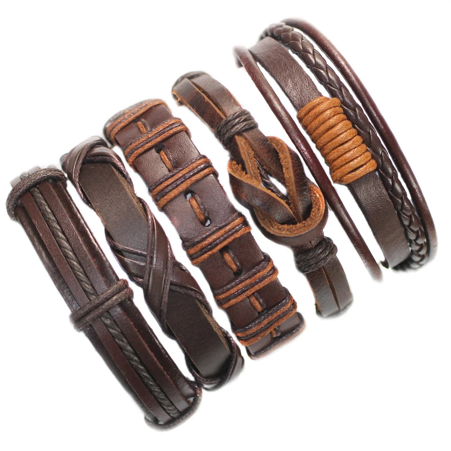 Set of brown leather bracelets on a white background