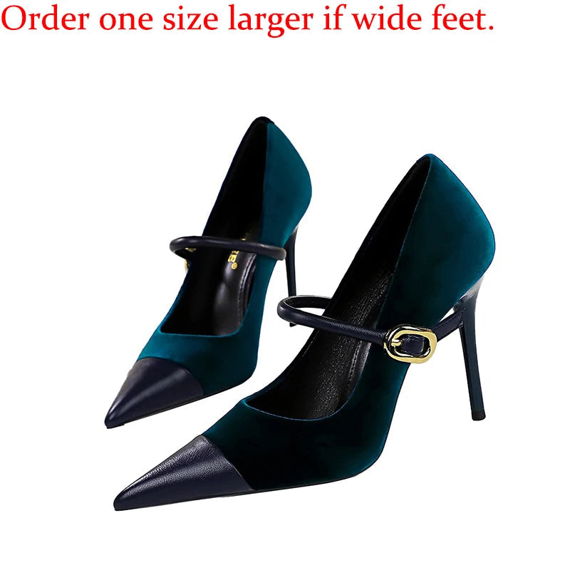Teal high-heeled shoes with black accents and gold buckle on a white background.