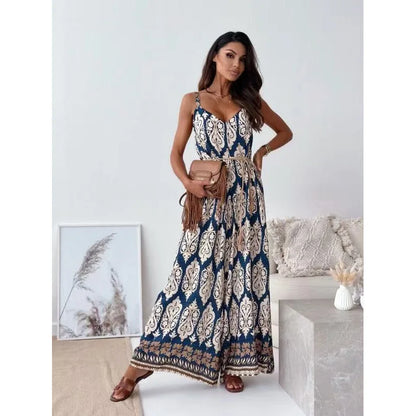 Woman wearing a patterned dress in a minimalistic room.