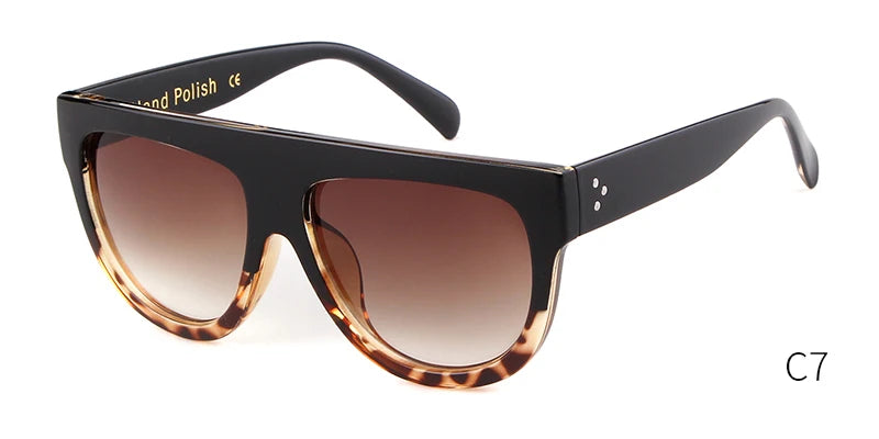 Sunglasses with black frame and tortoiseshell accents on a white background