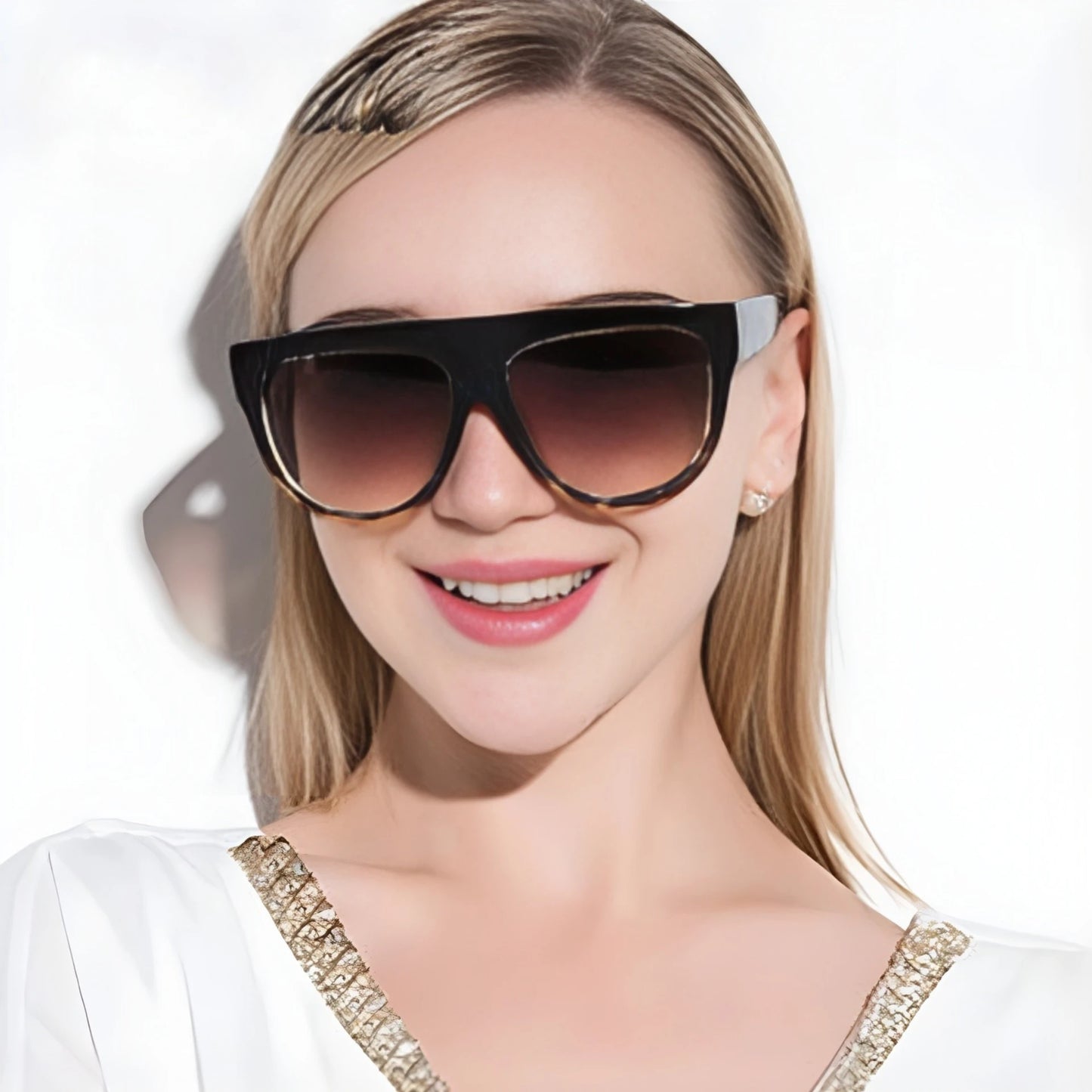 Woman wearing a stylish sunglasses with 'Who Cutie' branding on a white background
