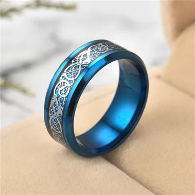 Blue ring with intricate design on a light background