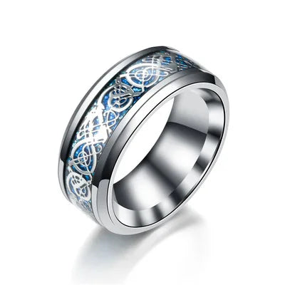 Silver ring with blue and white pattern on a white background
