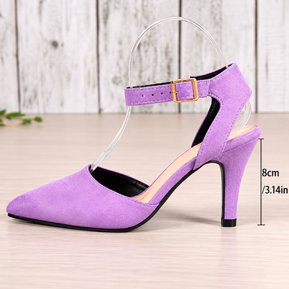 Elegant Pointed Toe Ankle Strap Heels in lavender with suede-look finish, adjustable gold buckle and slim 8 cm (3.14 inch) heel, shown in side view.