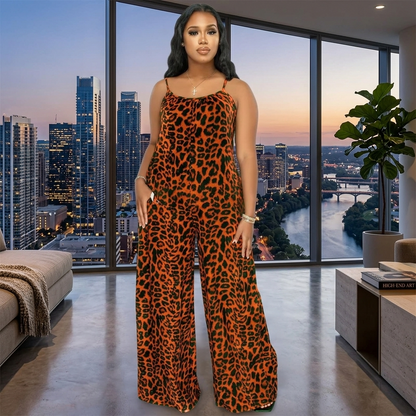 Woman in leopard print jumpsuit standing in a modern living room with cityscape view