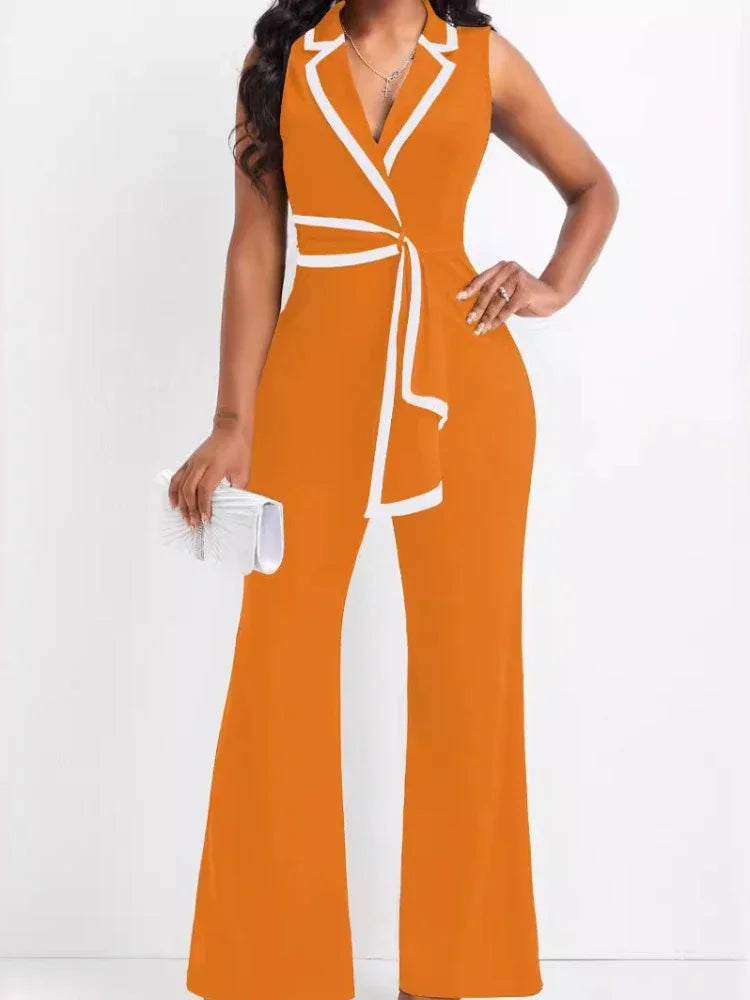 Orange jumpsuit with white accents worn by a model on a white background