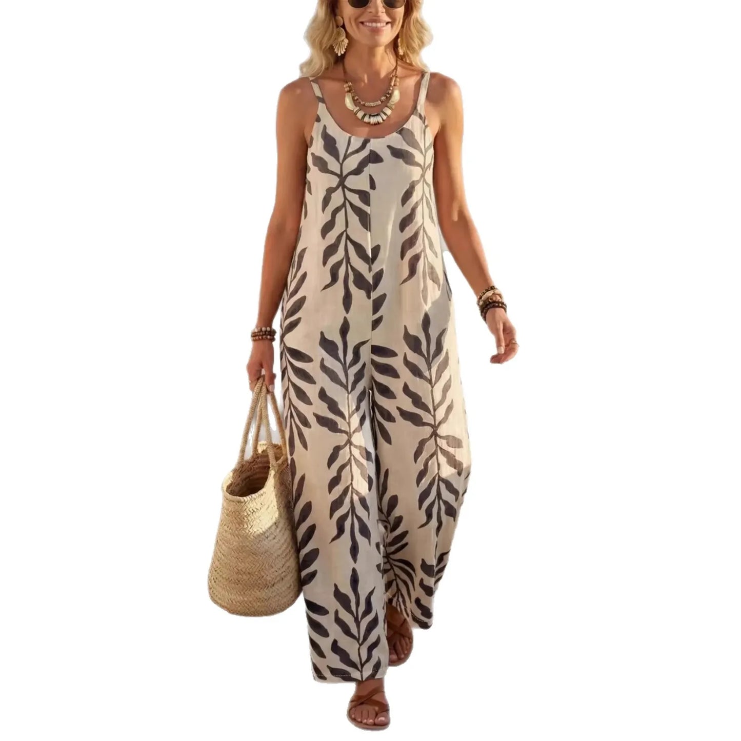 Woman wearing a leaf-patterned dress holding a straw bag on a white background