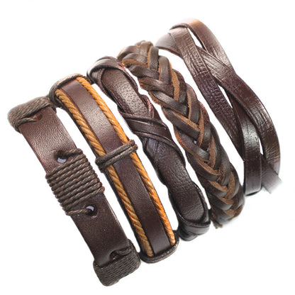 Set of brown leather bracelets with braided design on a white background