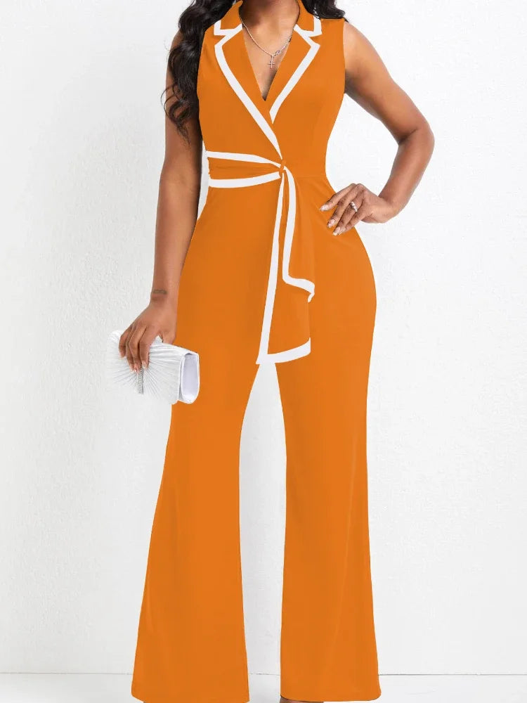 Orange jumpsuit with white accents worn by a model on a white background
