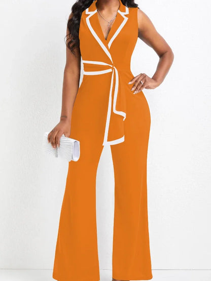 Orange jumpsuit with white accents worn by a model on a white background