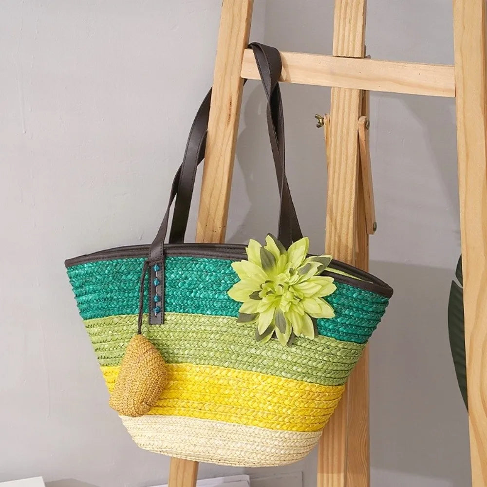 Woven bag with green, yellow, and brown stripes on a wooden ladder.