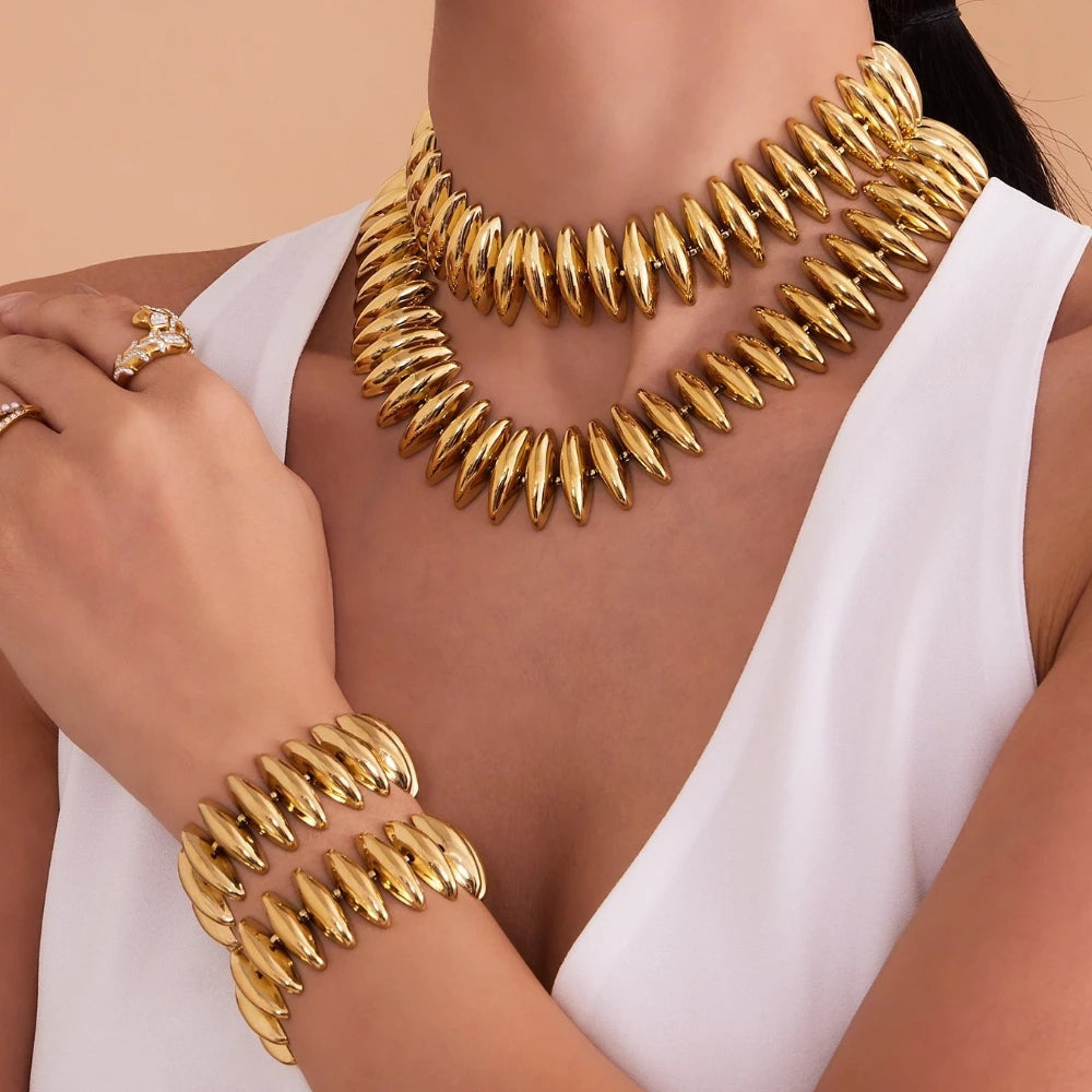 Sculptural Gold Beaded Jewelry Collection