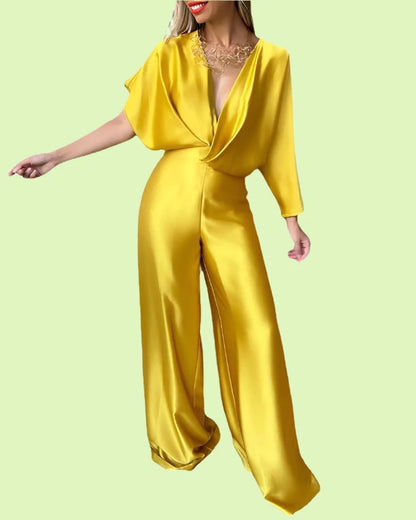 Yellow jumpsuit styled with a statement belt