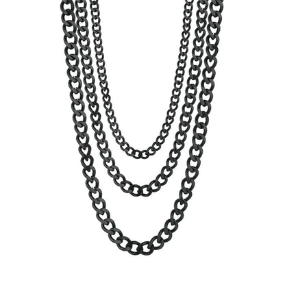 Three layered black metal curb chains of varying lengths, arranged in a cascading drape on a plain white background.