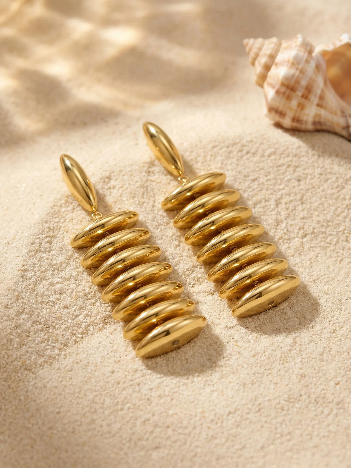 Sculptural Gold Beaded Jewelry Collection