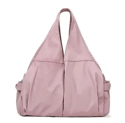 Pink handbag on a white background
