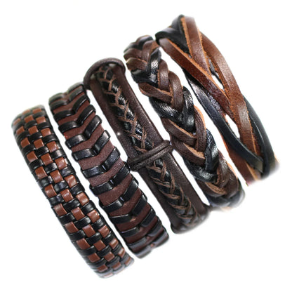 Set of braided leather bracelets in brown and black on a white background