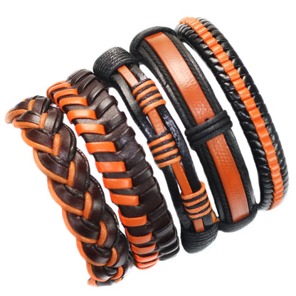 Three braided leather bracelets with orange and black patterns on a white background