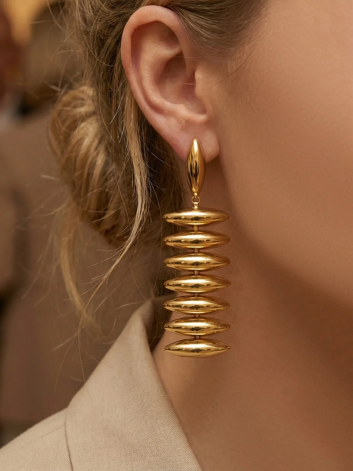 Sculptural Gold Beaded Jewelry Collection