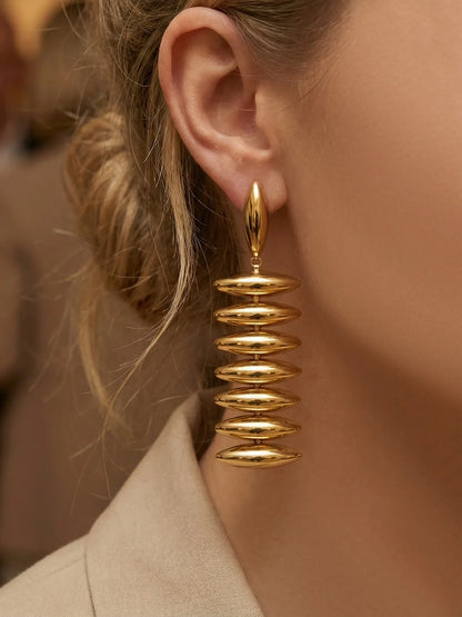 Sculptural Gold Beaded Jewelry Collection