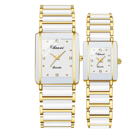 Pair of Chenxi watches with white faces and gold accents on a white background