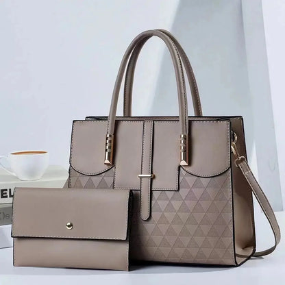 Gray handbag with a matching wallet on a light background