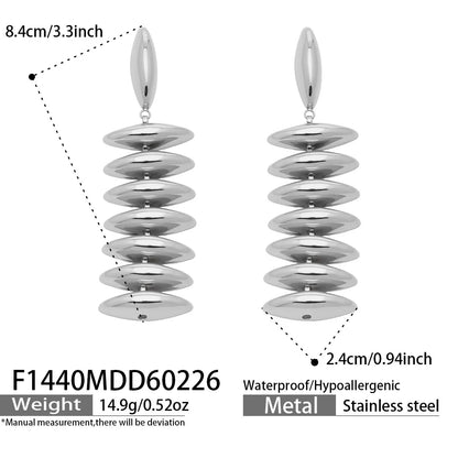 Pair of silver spiral earrings with measurements and product details on a white background