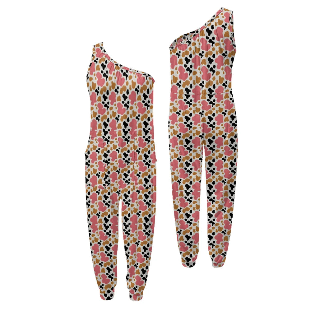 Floral patterned one-shoulder jumpsuit on a white background.