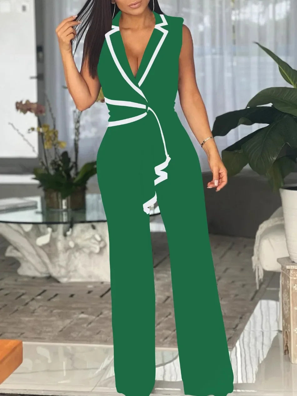 Woman wearing a green jumpsuit in an indoor setting