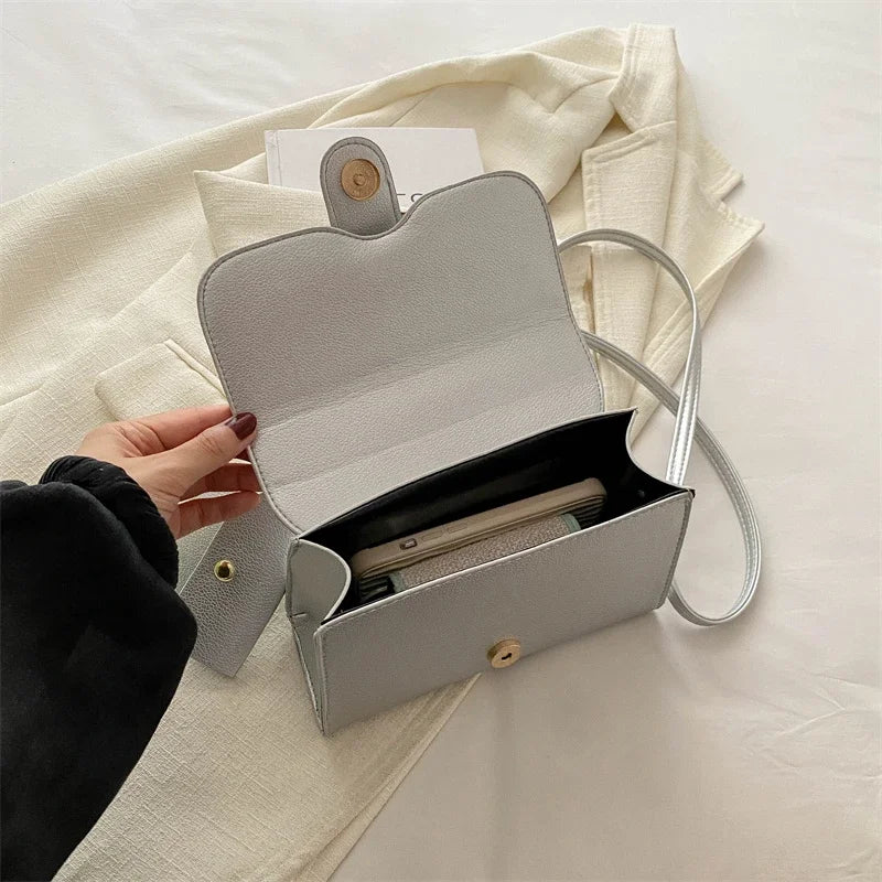 Structured Buckle Top-Handle Mini Bag