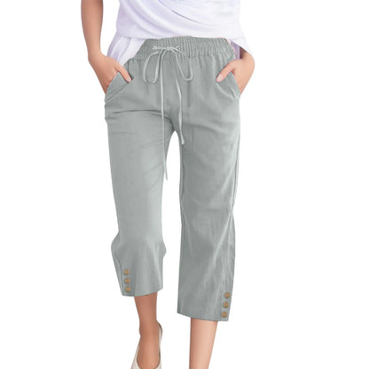 Light gray capri pants with drawstring waist on a white background