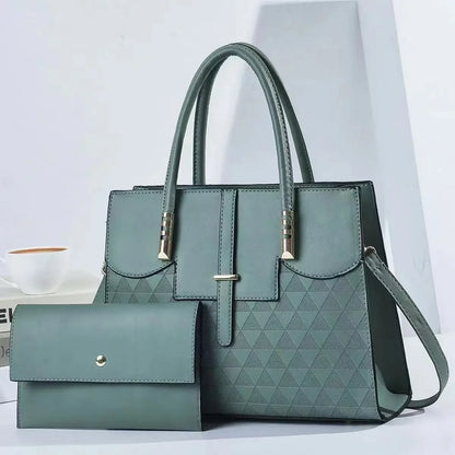 Green handbag with a matching wallet on a white background