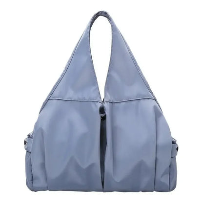 Light blue handbag on a white background
