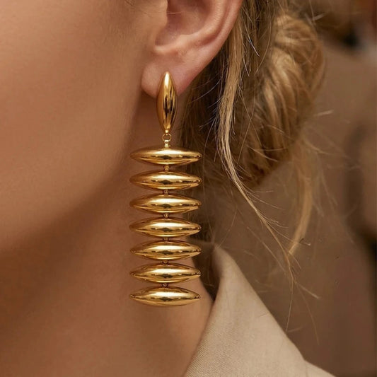 Sculptural Gold Beaded Jewelry Collection