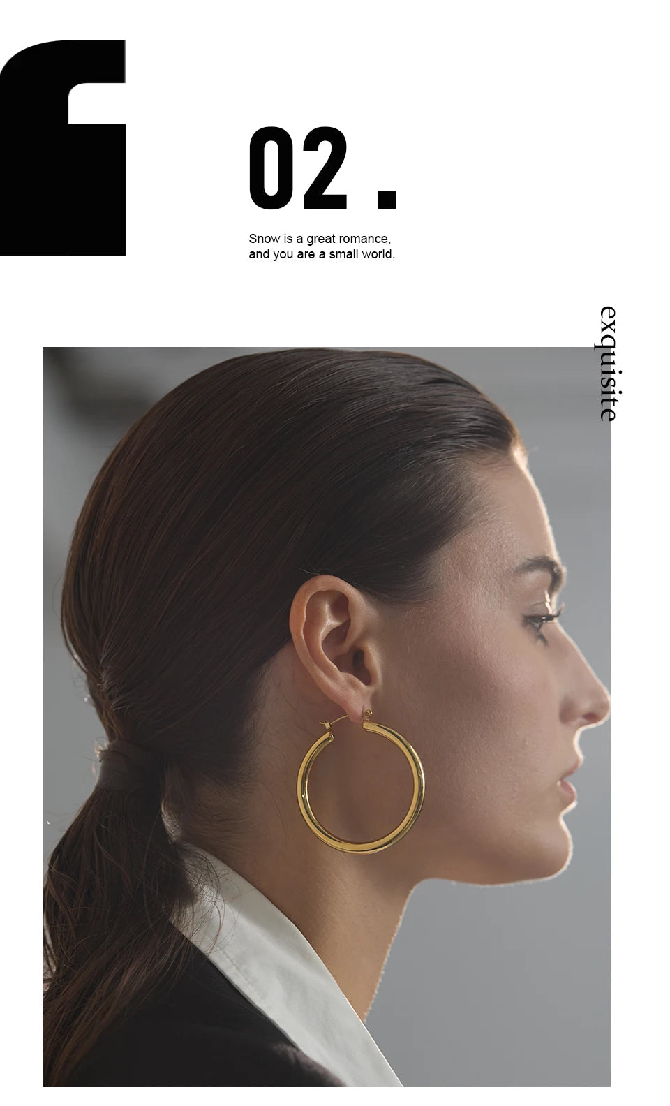 Woman wearing gold hoop earrings with a minimalistic background